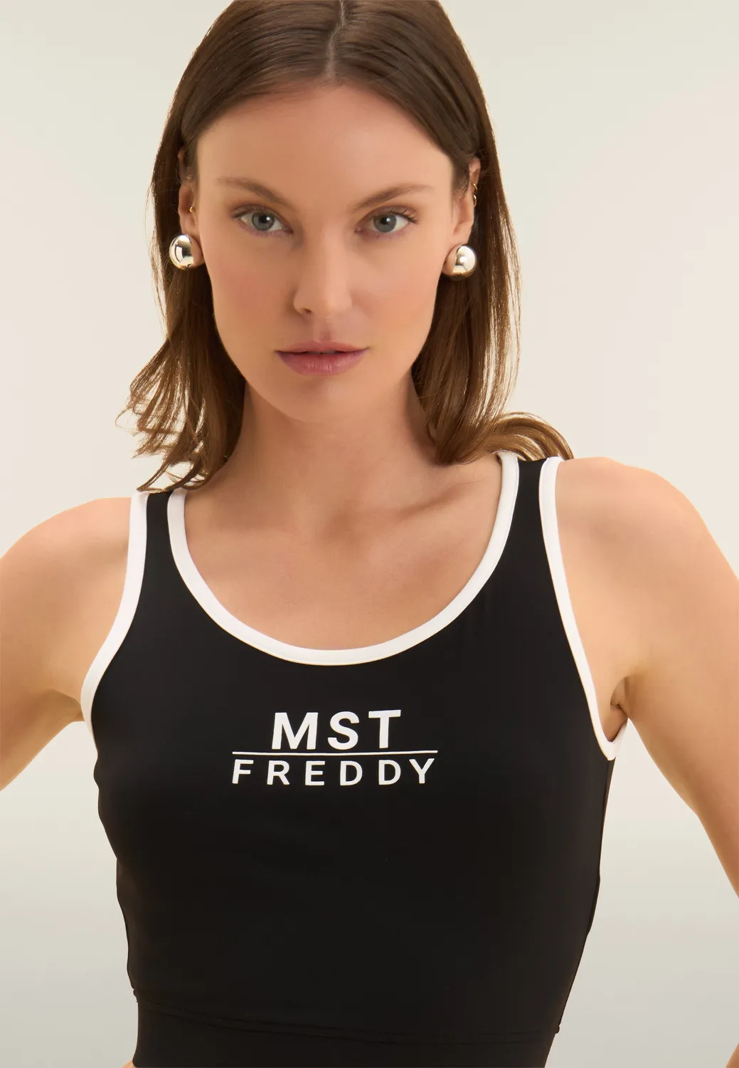 Freddy MST Cropped Sporttop Schwarz-Weiß mittlere Stütze