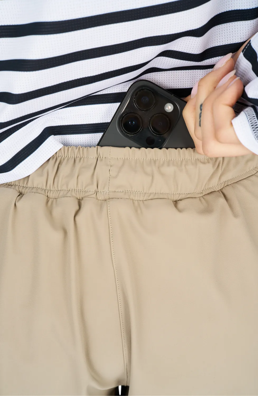 UNNA Flow Shorts 3" Laufshorts Warm Sand Innenhose