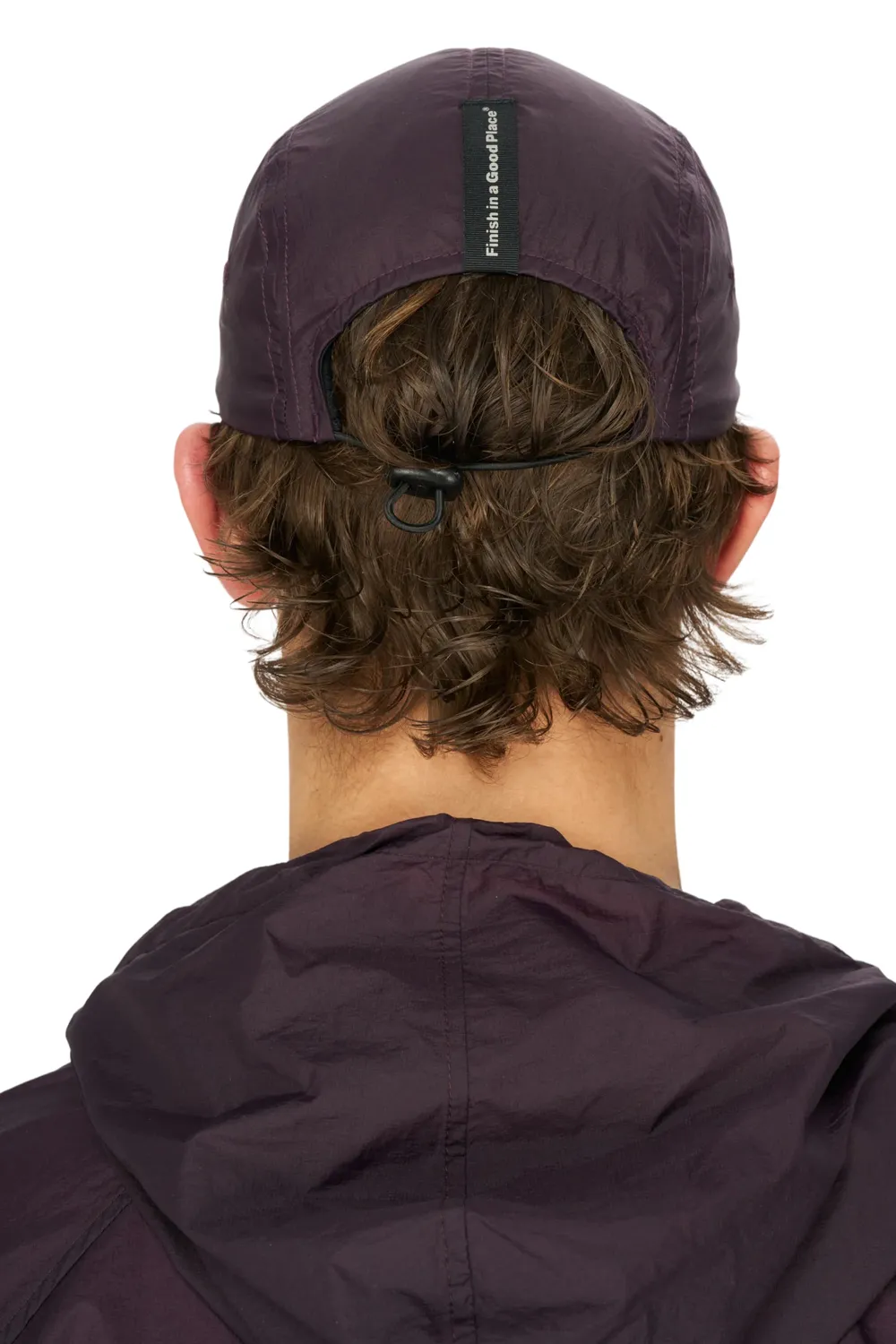 UNNA Smiles Run Cap Laufcap Aubergine Nylon