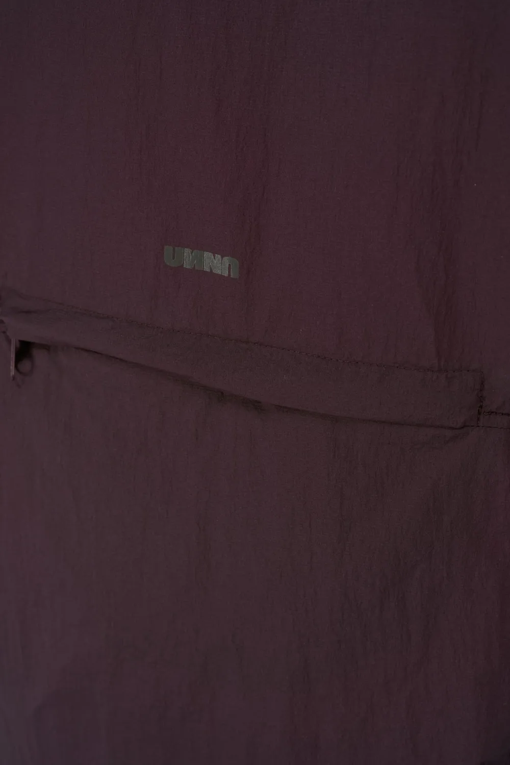 UNNA Smiles Run Jacket Laufjacke Aubergine winddicht