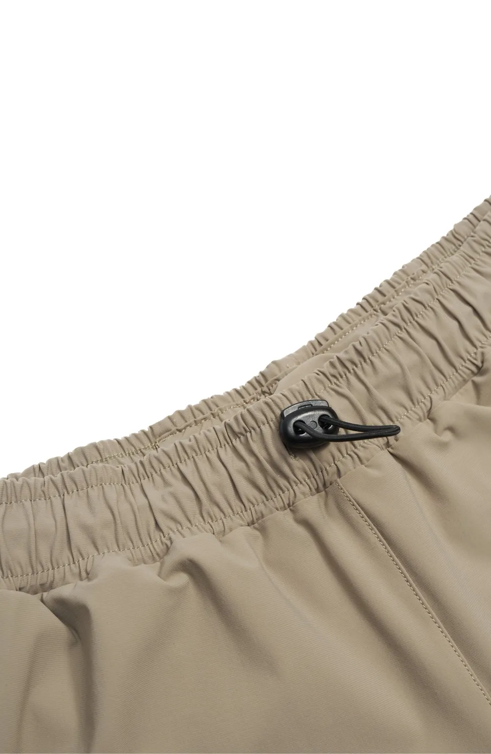 UNNA Flow Shorts 3" Laufshorts Warm Sand Innenhose