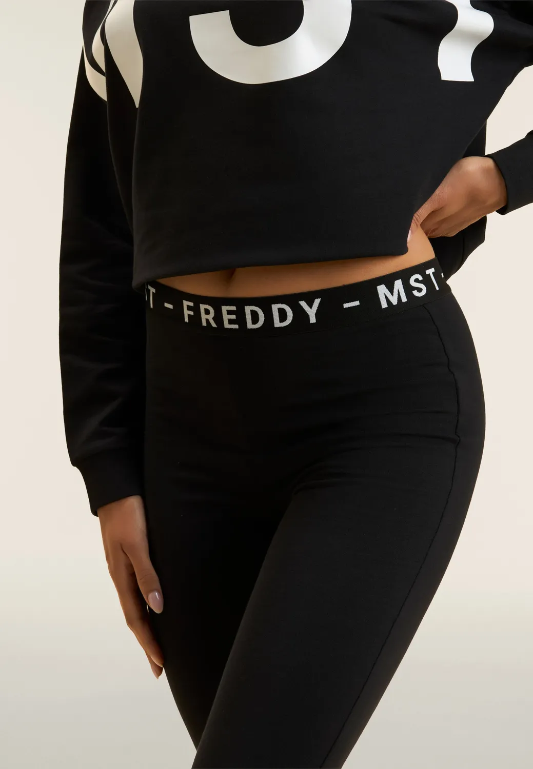 Freddy Sporthose Flare schwarz French Terry Stretch