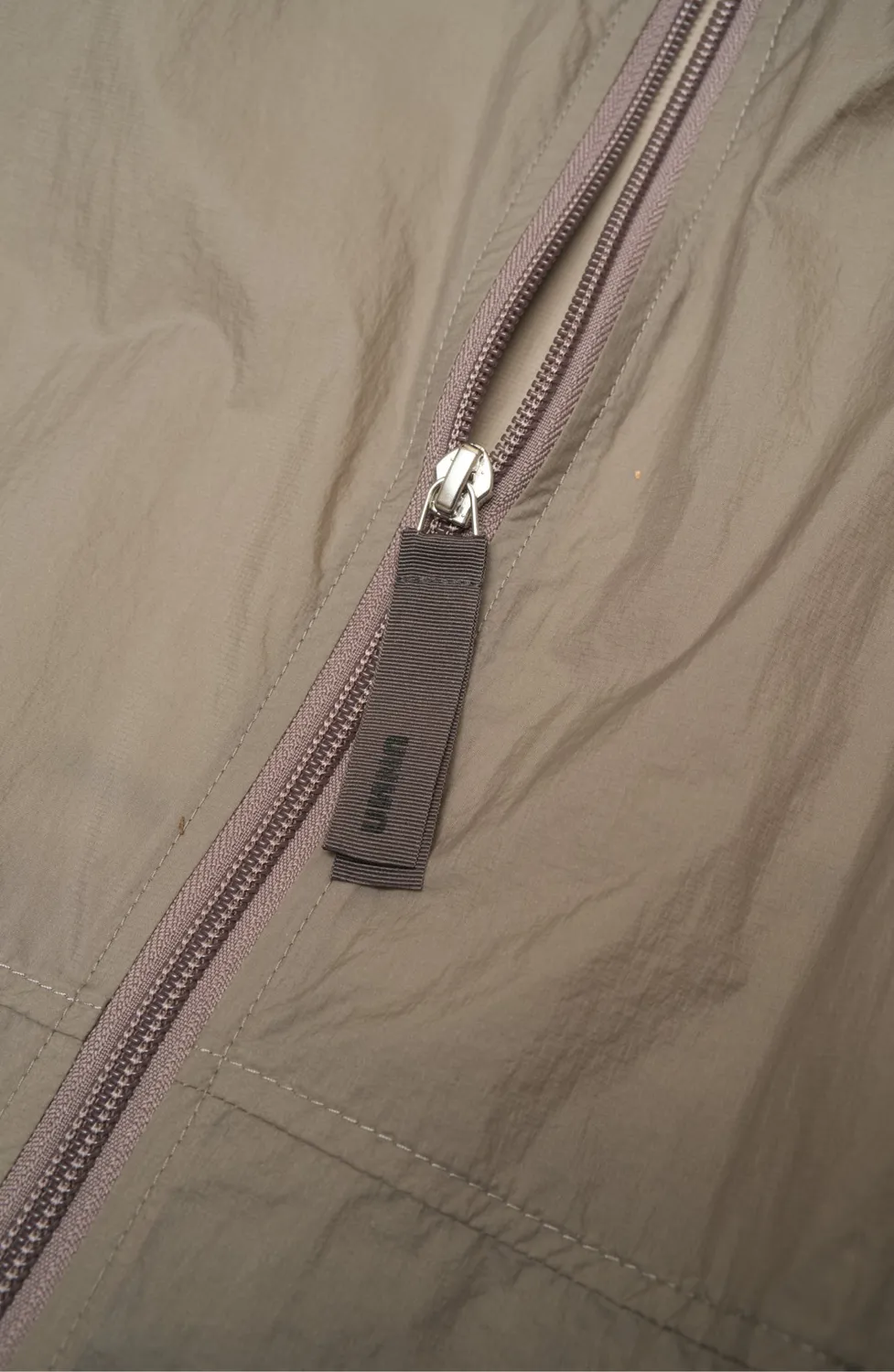 UNNA Smiles Run Jacket W Laufjacke Stone Grey winddicht