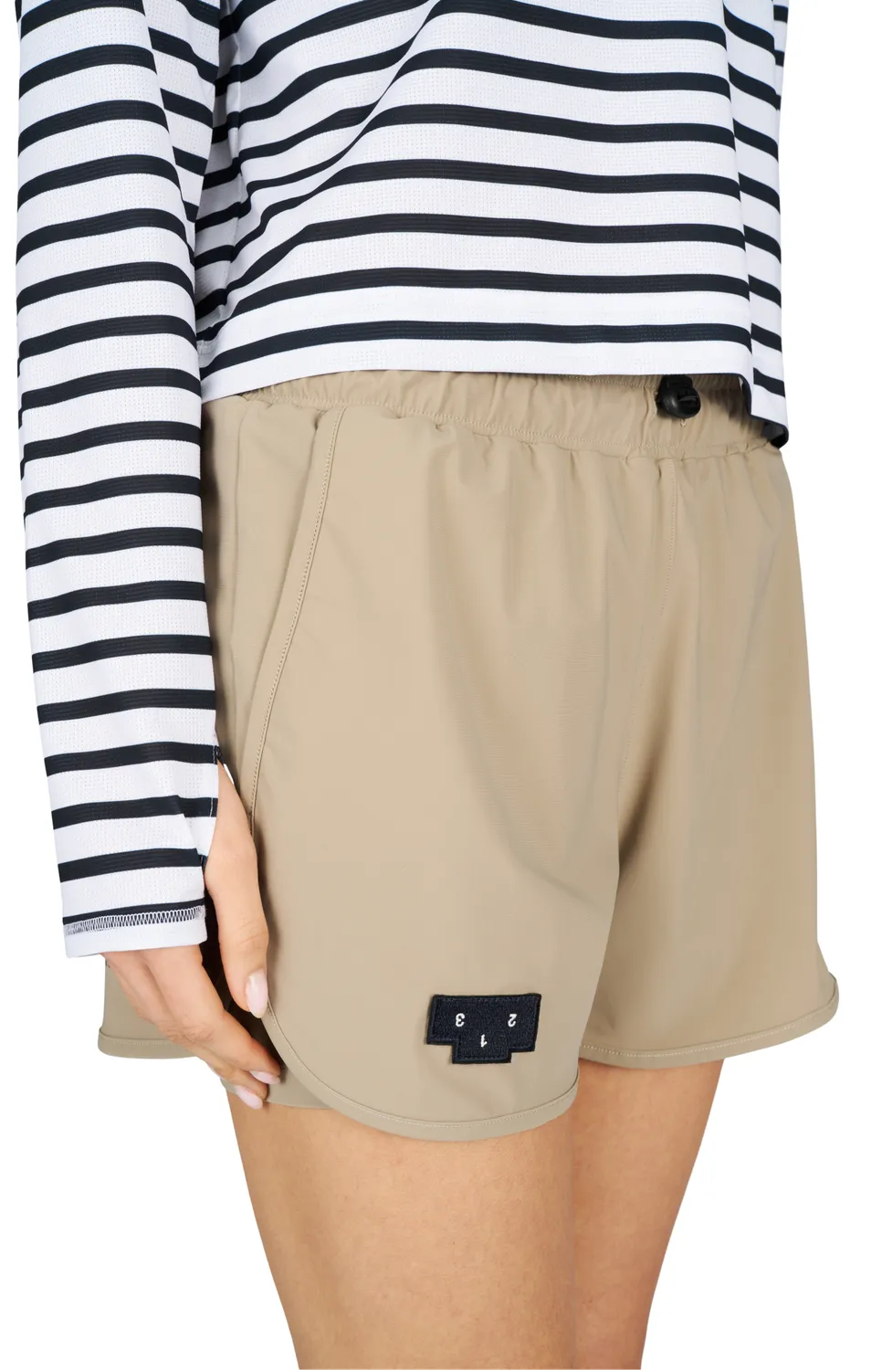 UNNA Flow Shorts 3" Laufshorts Warm Sand Innenhose